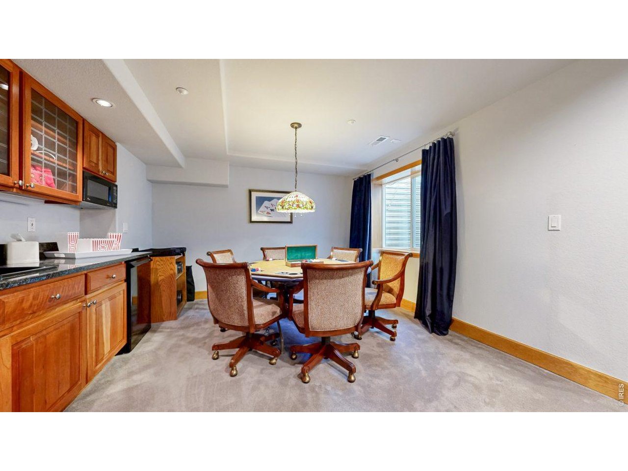 Card table in rear of theater room 