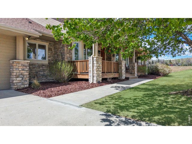 Property Photo 6 Driveway and front deck