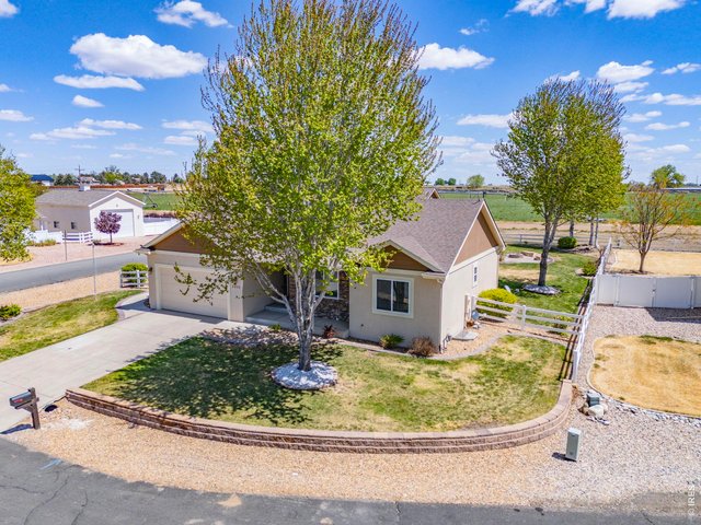 Property Photo 6 Situated on a private corner lot in a quiet cul-de-sac, this property backs to farm ground offering a peaceful, tucked-away feeling while still being conveniently close to town and ample amenities.