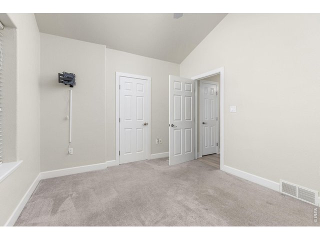 Property Photo 34 Bedroom #5. The basement also features two bedrooms and an updated full bathroom.