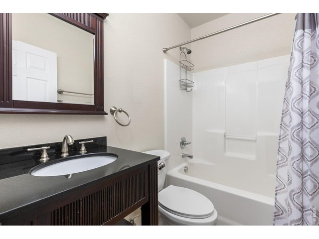 Property Photo 26 Main level full bathroom with updated vanity & lighting!