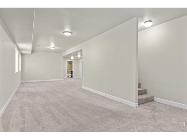 Property Photo 27 Another standout feature of the home is the fully finished basement featuring a large rec room that gives you flexibility for entertaining or relaxing.