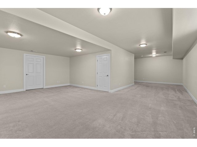 Property Photo 30 Another standout feature of the home is the fully finished basement featuring a large rec room that gives you flexibility for entertaining or relaxing.