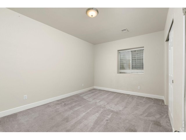 Property Photo 32 The basement also features two bedrooms and an updated full bathroom.
