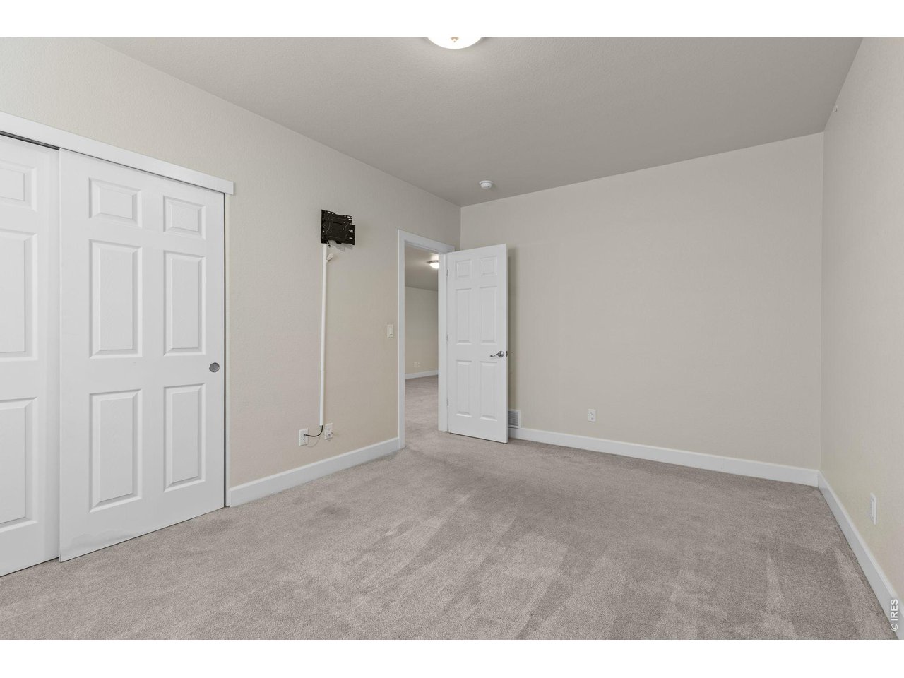 Bedroom #4. The basement also features two bedrooms and an updated full bathroom.