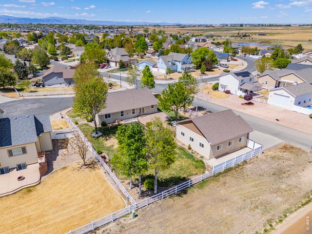 Property Photo 46 Situated on a private corner lot in a quiet cul-de-sac, this property backs to farm ground offering a peaceful, tucked-away feeling while still being conveniently close to town and ample amenities.