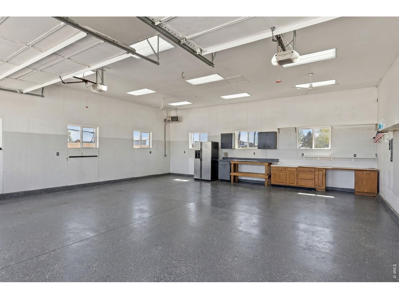 One of the standout features is the fully finished and heated 1,080 sq ft shop (34 ft X 32 ft), perfect for projects, storage, or a true hobby space. Shop has 220 AMP service. Shop has epoxy coating.