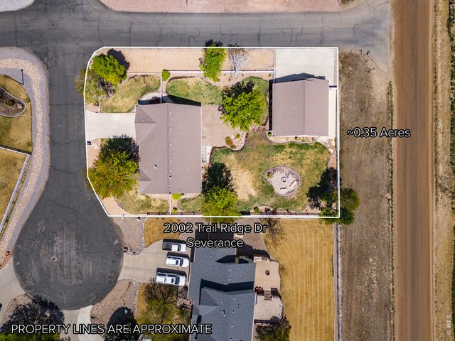 Property Photo 7 Situated on a private corner lot in a quiet cul-de-sac, this property backs to farm ground offering a peaceful, tucked-away feeling while still being conveniently close to town and ample amenities.