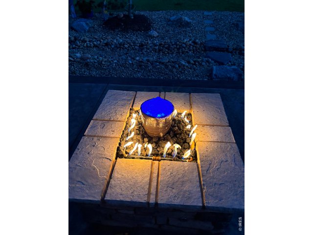 Property Photo 39 Imagine sitting with your guests at this lit up Fire-Water Pit! One of the few that combine both fire & water features that run at the same time!
