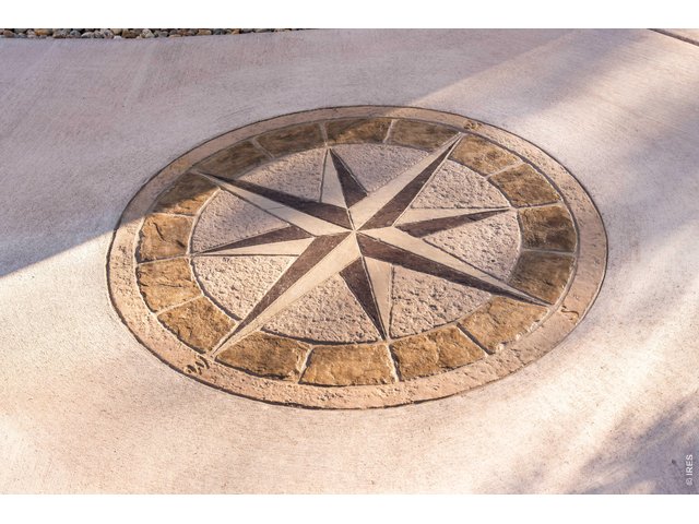Property Photo 36 Compass stamped in concrete tells you the time of day