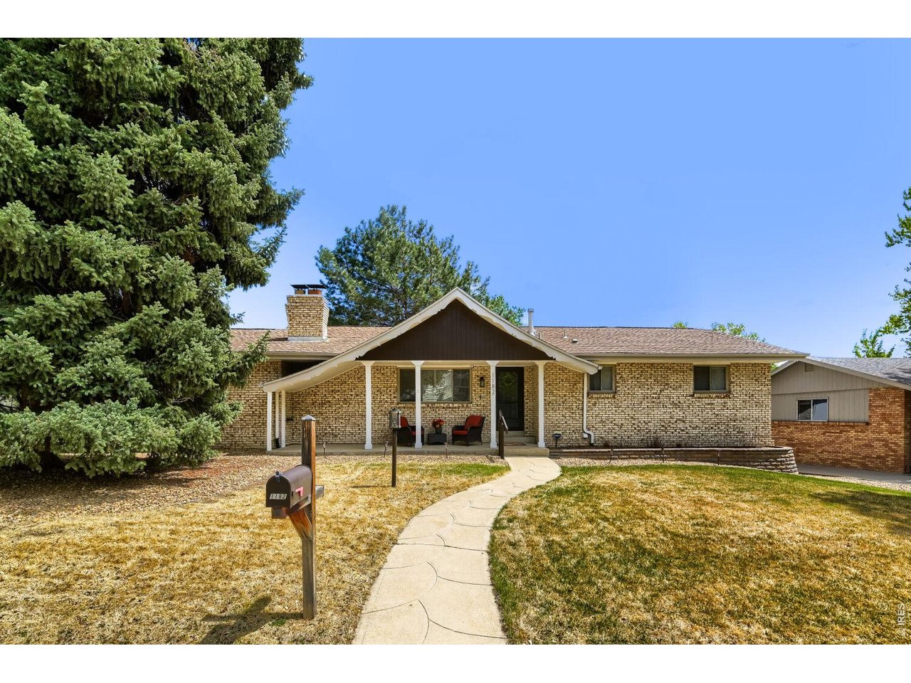 Stunning ranch with 1080 sq ft detached RV/shop/garage!