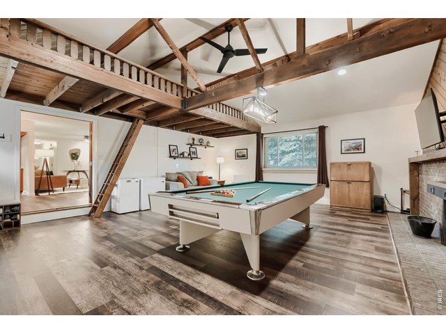 Property Photo 16 Watch the big game while playing pool! Extra loft storage too!