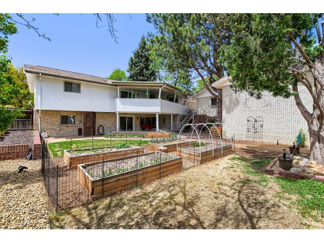 Property Photo 28 Gorgeous garden beds, new landscaping and sprinkler system