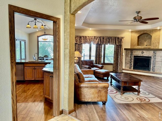 Property Photo 9 Entry From Foyer to Kitchen and Living Room