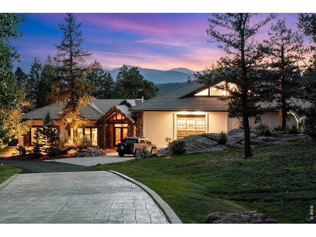 Property Photo 7 Building number 2 features a pro size half basketball court (current auto garage), full gym, hot tub, bath, sauna and lounge