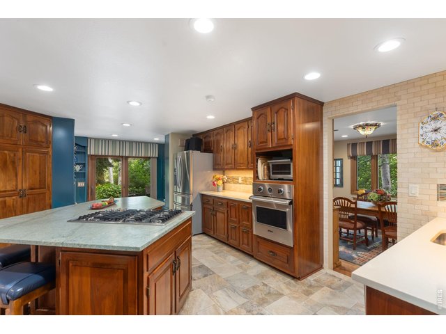 Property Photo 30 Kitchen w/ view to sliding glass door to backyard