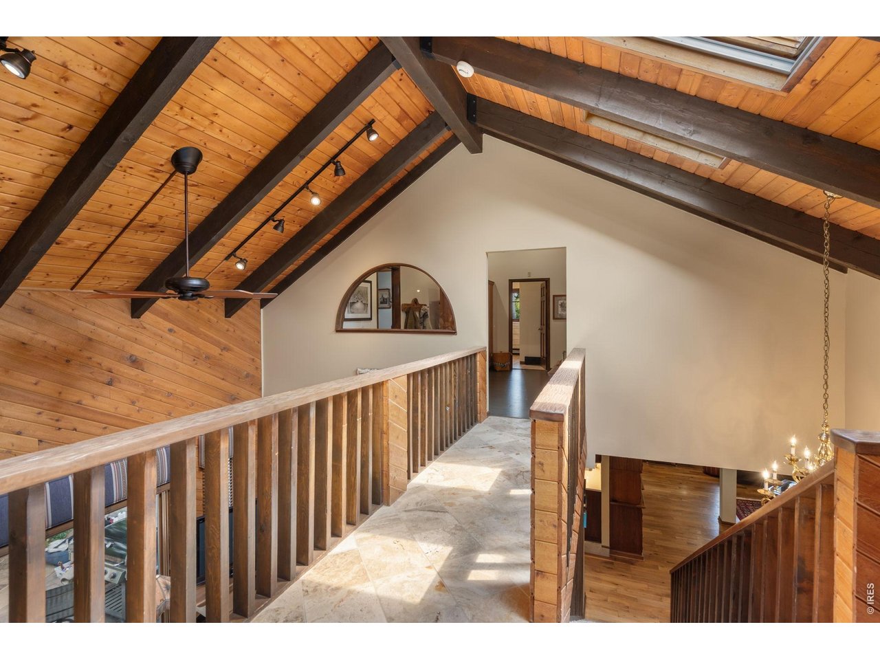 Suspended walkway to additional bedrooms, laundry and office