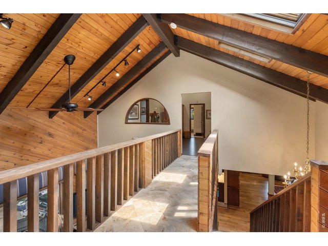 Property Photo 38 Suspended walkway to additional bedrooms, laundry and office