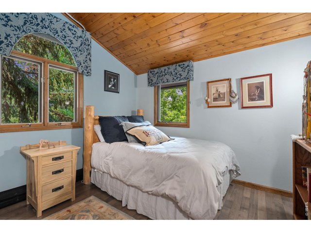 Property Photo 44 Additional guest bedroom w/ vaulted T&G ceilings