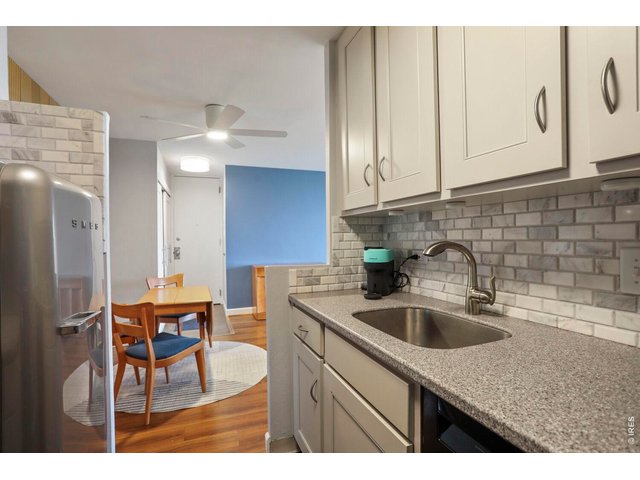 Property Photo 7 Kitchen opens to the dining space