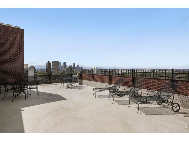 Property Photo 26 Gathering area on the roof top next to the pool