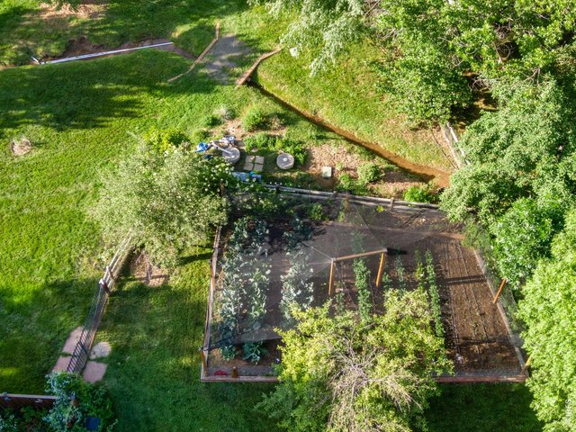 Property Photo 12 Vegetable Garden and Irrigation Ditch