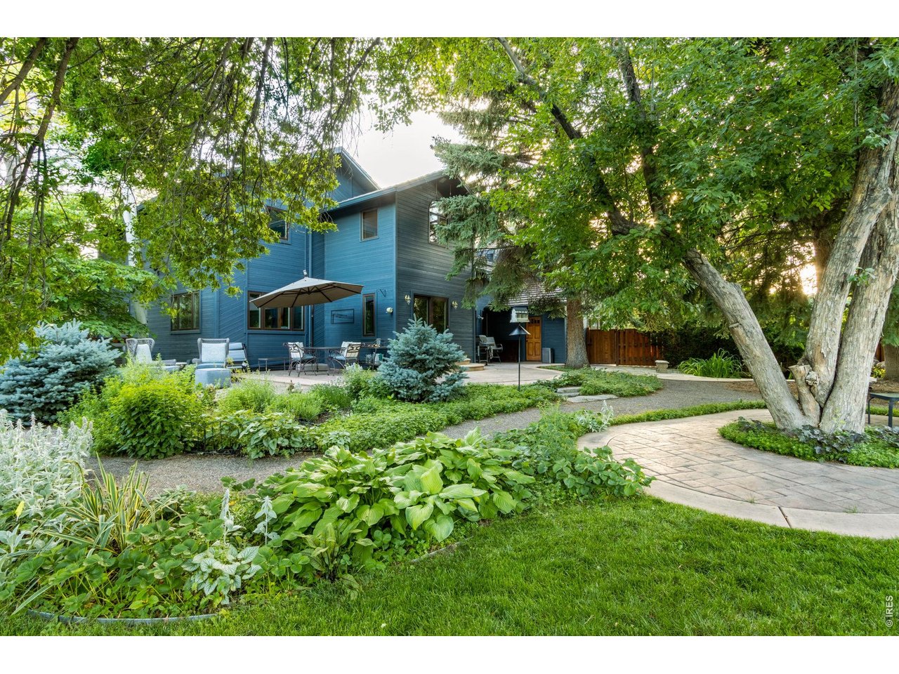 Your backyard oasis awaits w/ privacy, mature trees and koi pond.