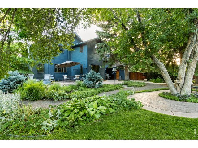 Property Photo 46 Your backyard oasis awaits w/ privacy, mature trees and koi pond.