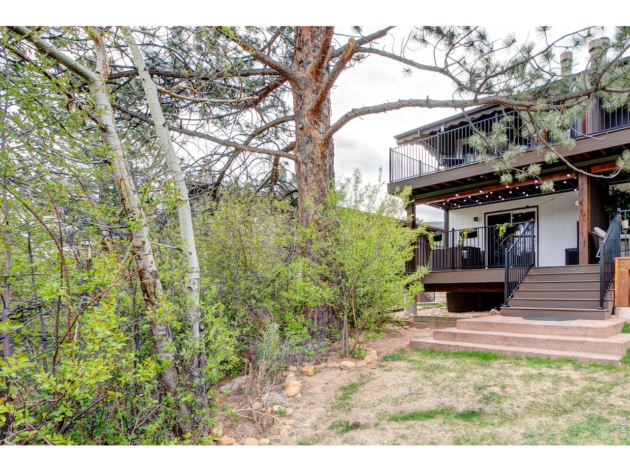 1st floor deck, steps from the river & open space!