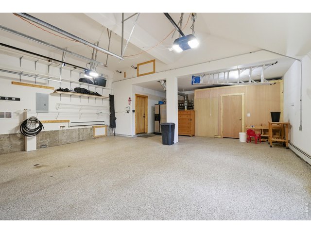 Property Photo 33 Oversized garage with storage closet 