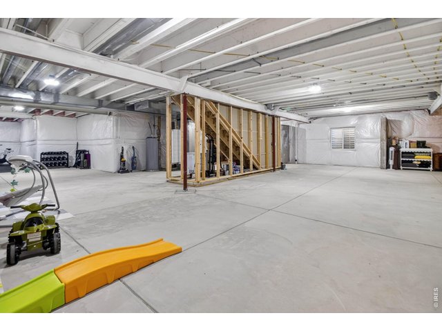Property Photo 32 This basement wraps all the way around if you wanted to add a wet bar, guest suite, or custom entertainment space
