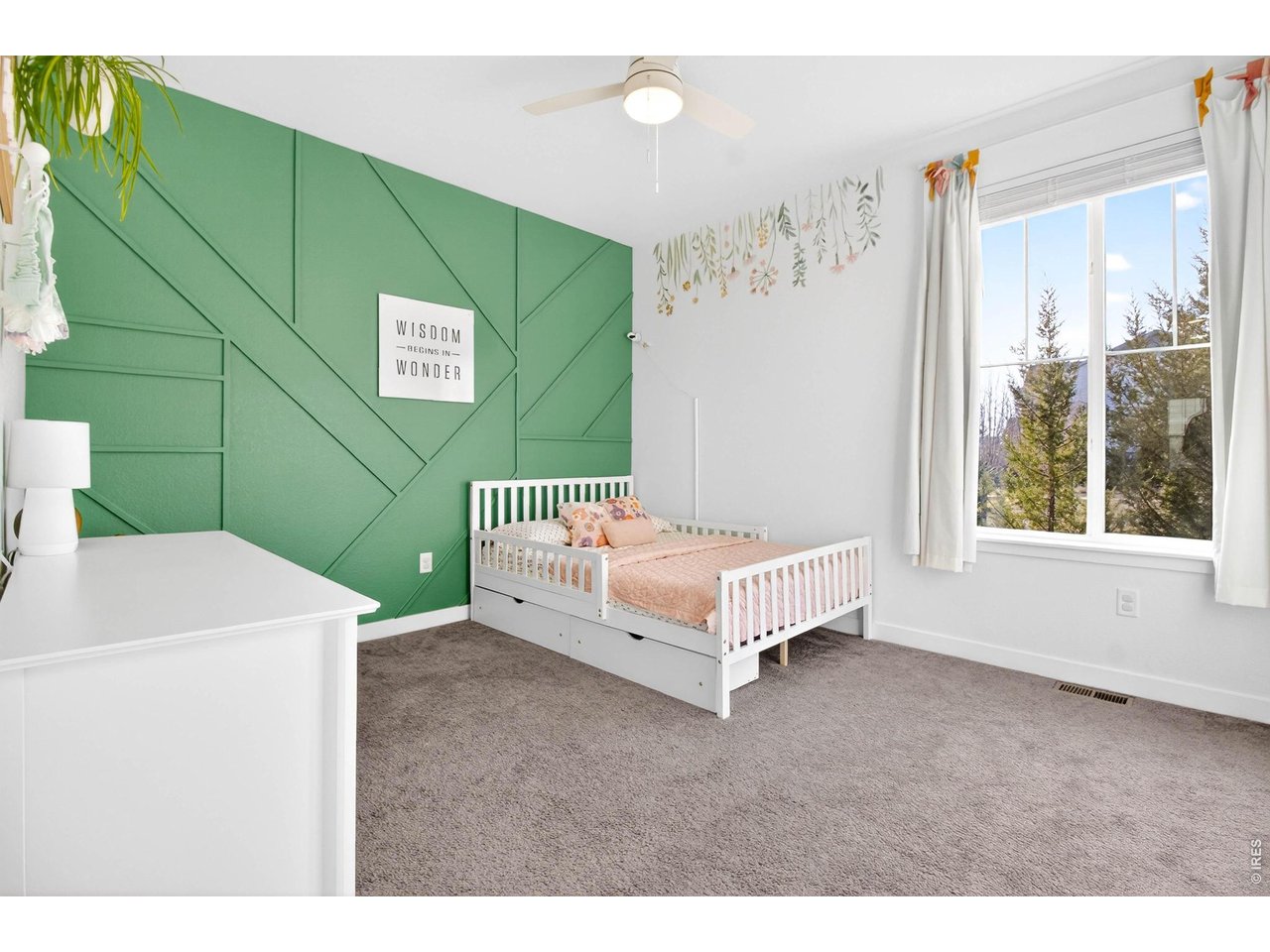 beautifully updated additional room with a large window