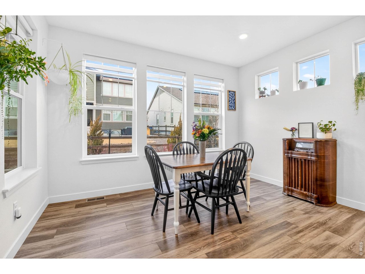 spacious dining nook with all the windows
