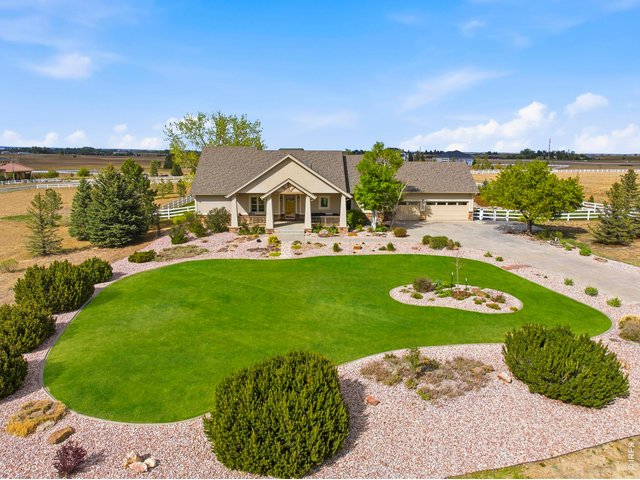 Property Photo 3 Irrigated and professionally maintained landscaping