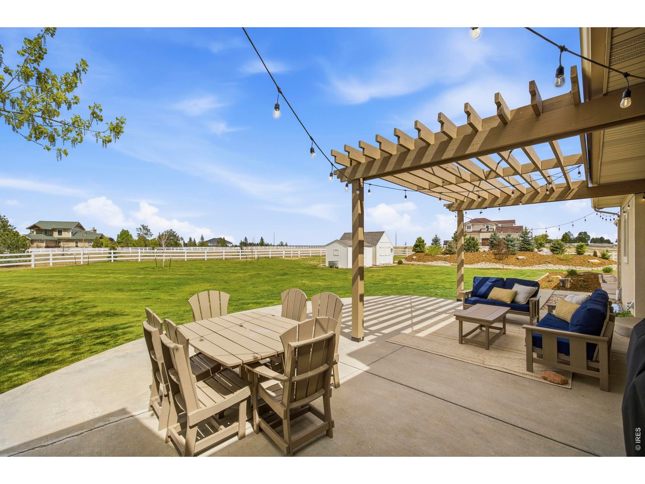 Back patio with fully fenced yard, perfect for pets