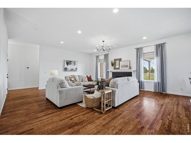 Property Photo 10 Real wood floors and brand new carpet throughout