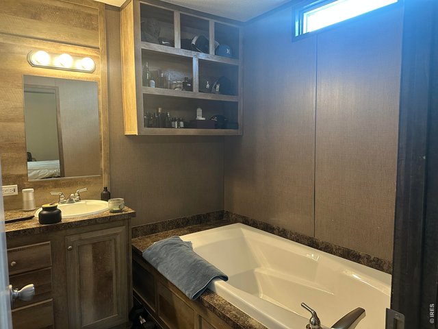 Property Photo 12 Master Bathroom 