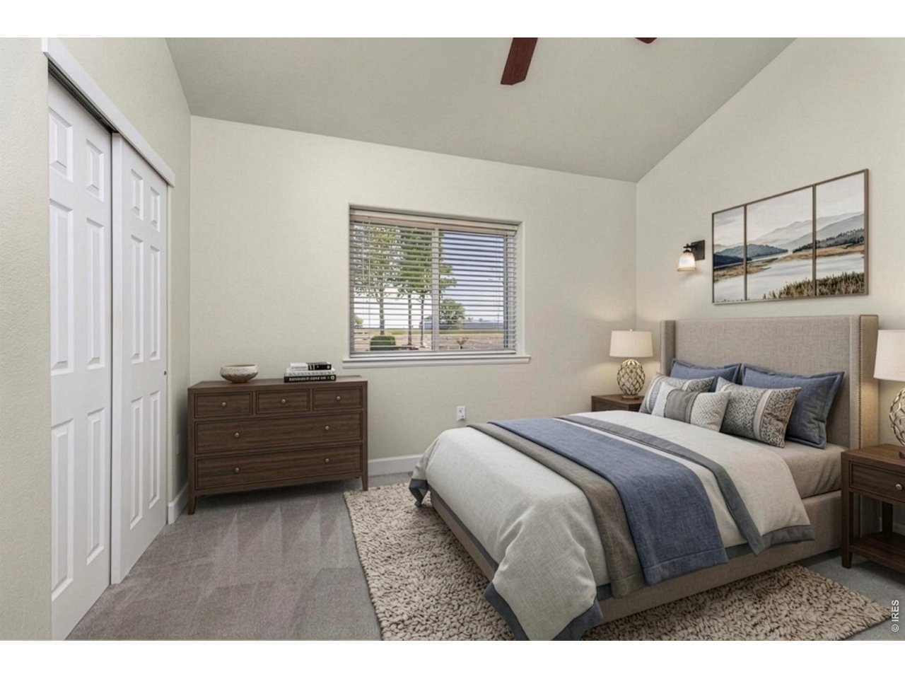The primary suite has a fully updated bathroom with tile flooring, quartz countertops, and large tile shower.