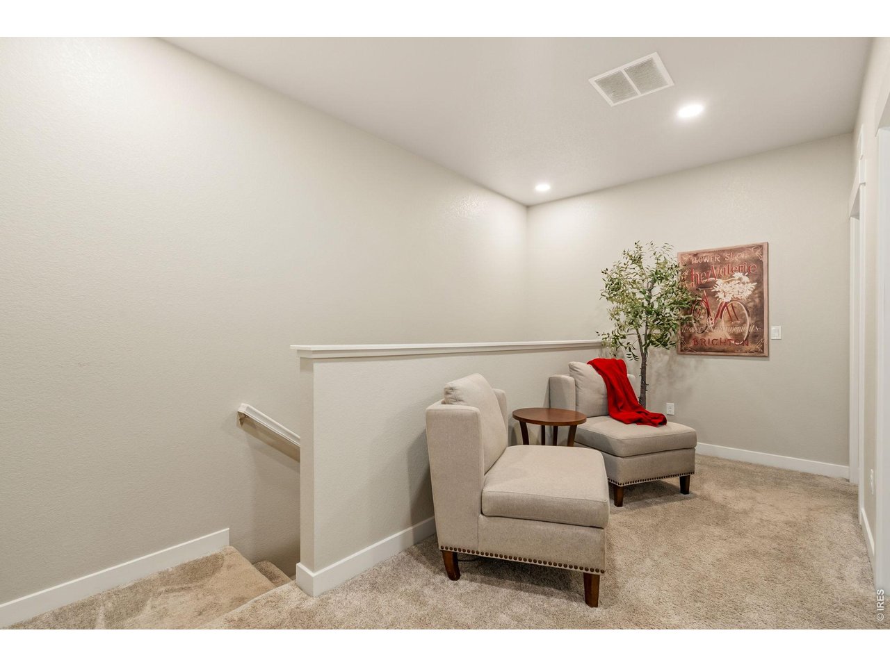 Upper-level loft or flex space ideal for office or media area