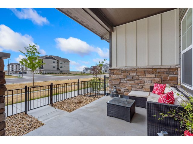 Property Photo 3 Enjoy your mornings and evenings on your own privately fenced patio.
