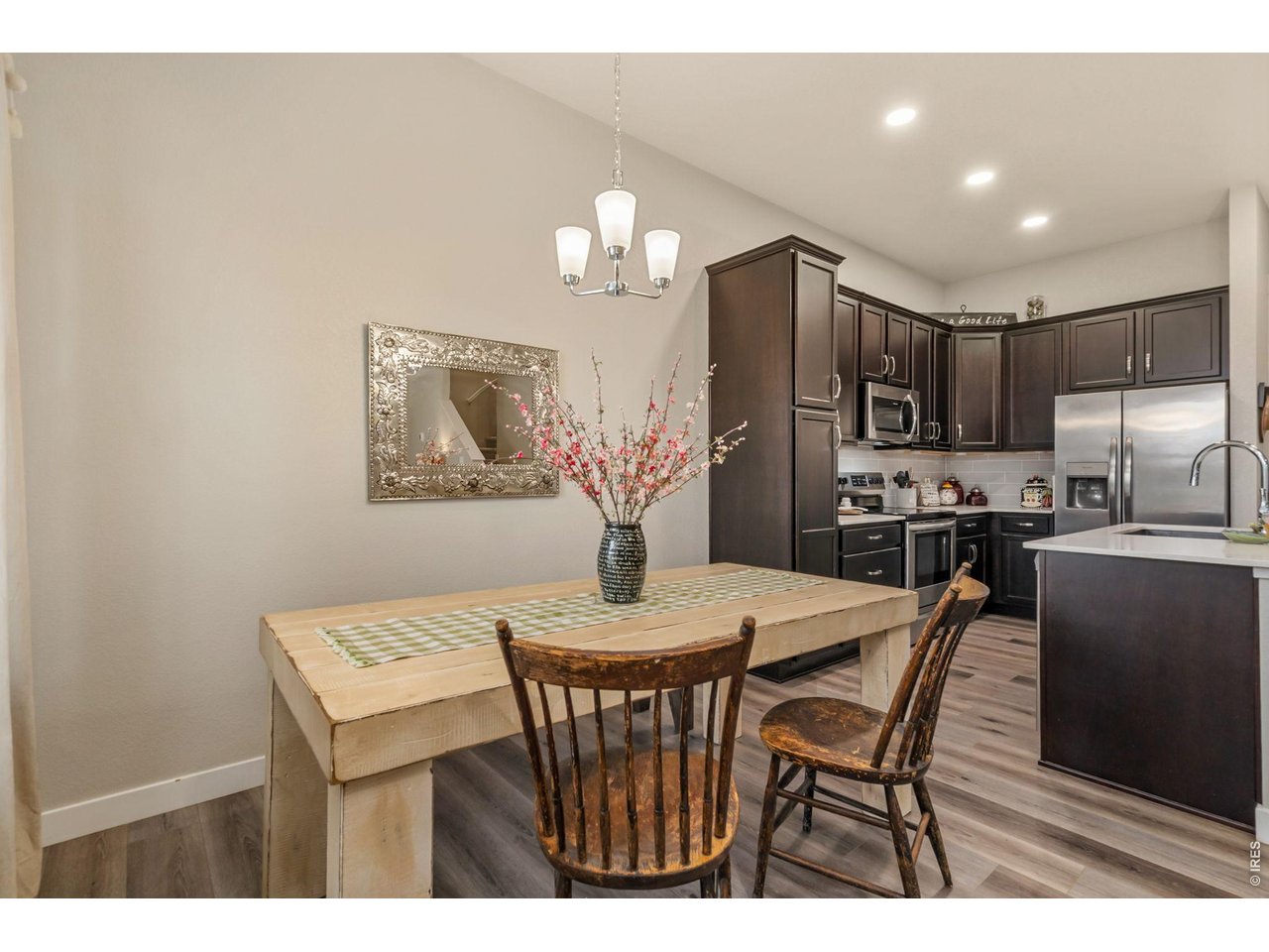  Dining area positioned adjacent to kitchen and living spaces