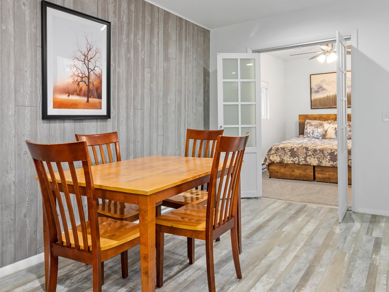 French doors into guest cottage bedroom