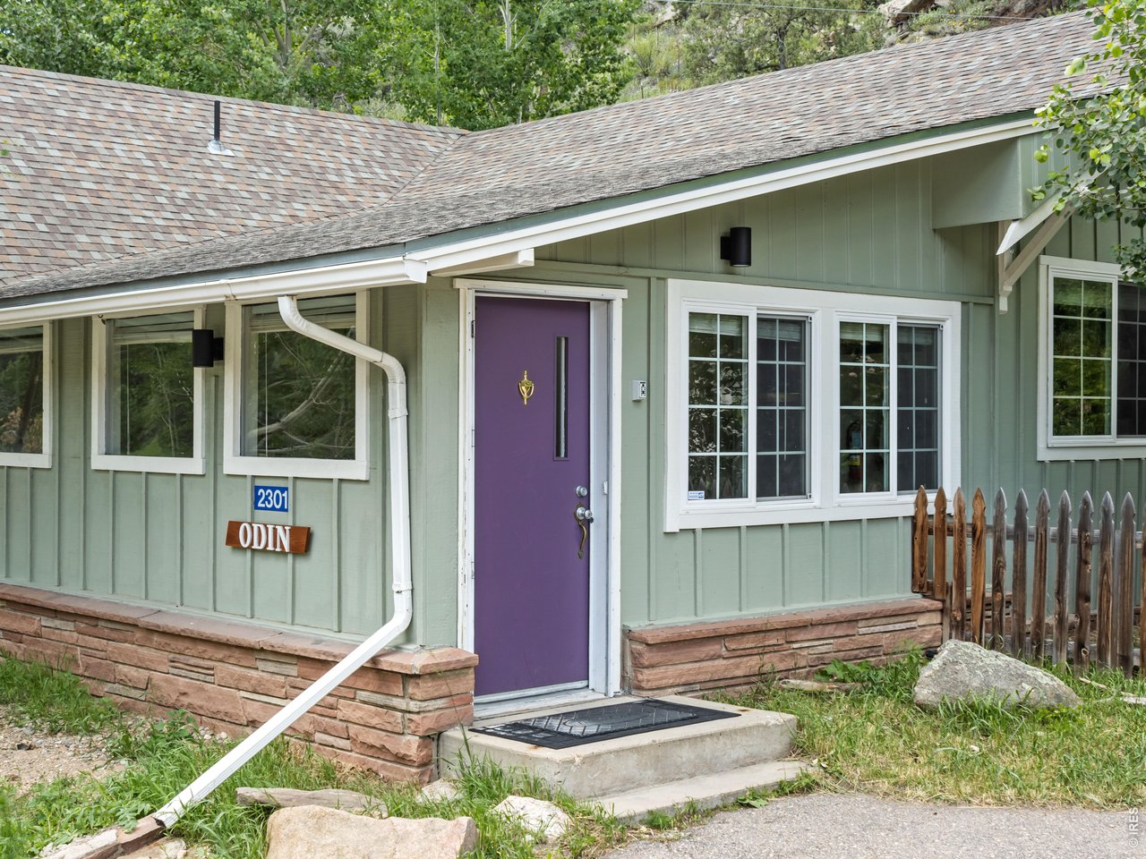 Gotta love a purple front door!