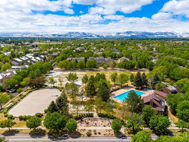 Property Photo 5 Gorgeous community pool is just a block or 2 to the south, clubhouse/fitness area. 