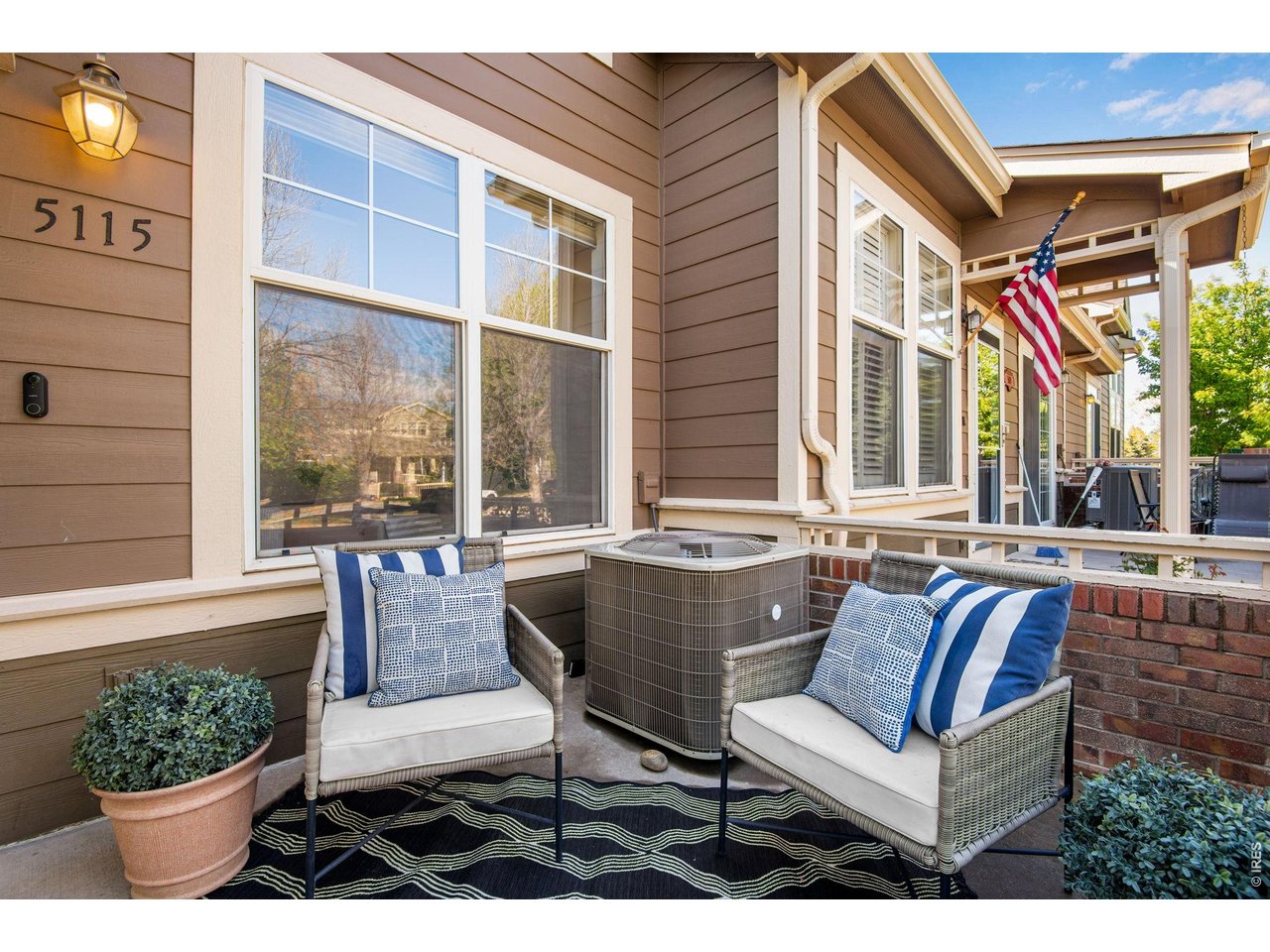 Adorable Brick front porch, east facing! 