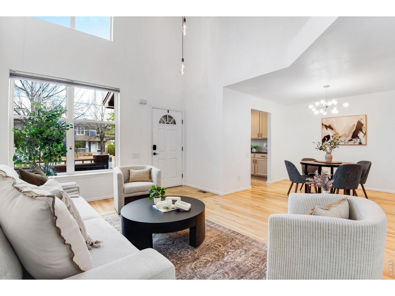 Generous ceiling heights and picture windows frame the day from the moment it begins.