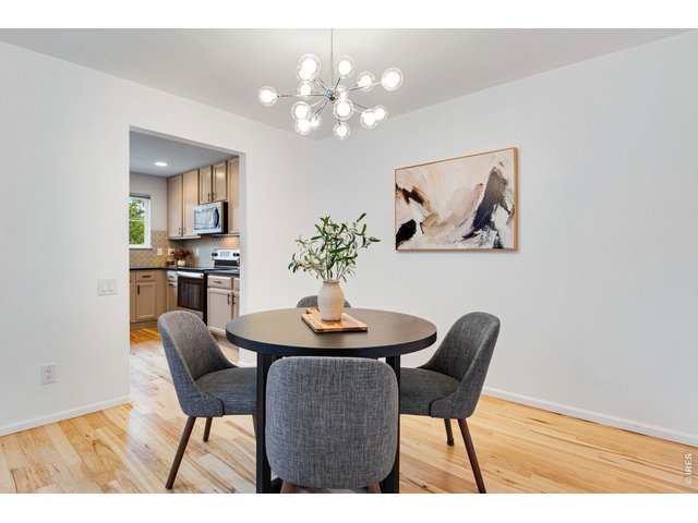 Property Photo 15 An elegantly scaled dining space appointed with custom light fixture.