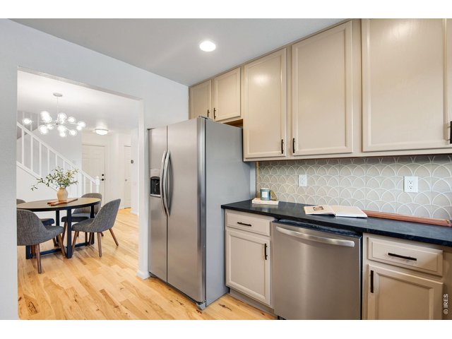 Property Photo 17 Another Kitchen angle, solid site finished Hickory Floors. 