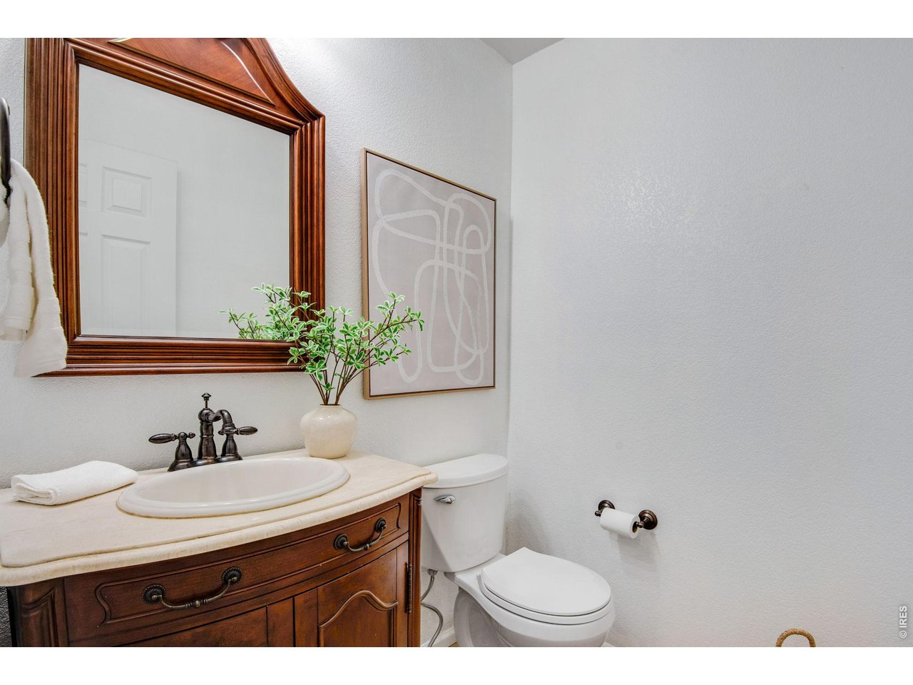 Main Level Powder Bathroom, every room has been touched and updated - beautiful personal faucets & countertops. 