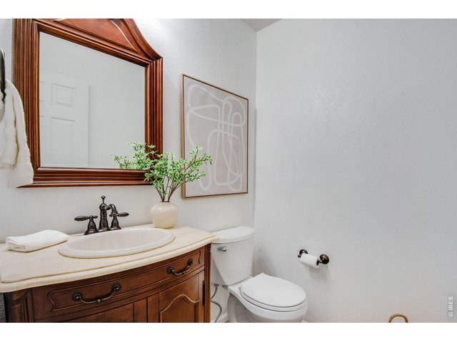 Property Photo 21 Main Level Powder Bathroom, every room has been touched and updated - beautiful personal faucets & countertops. 